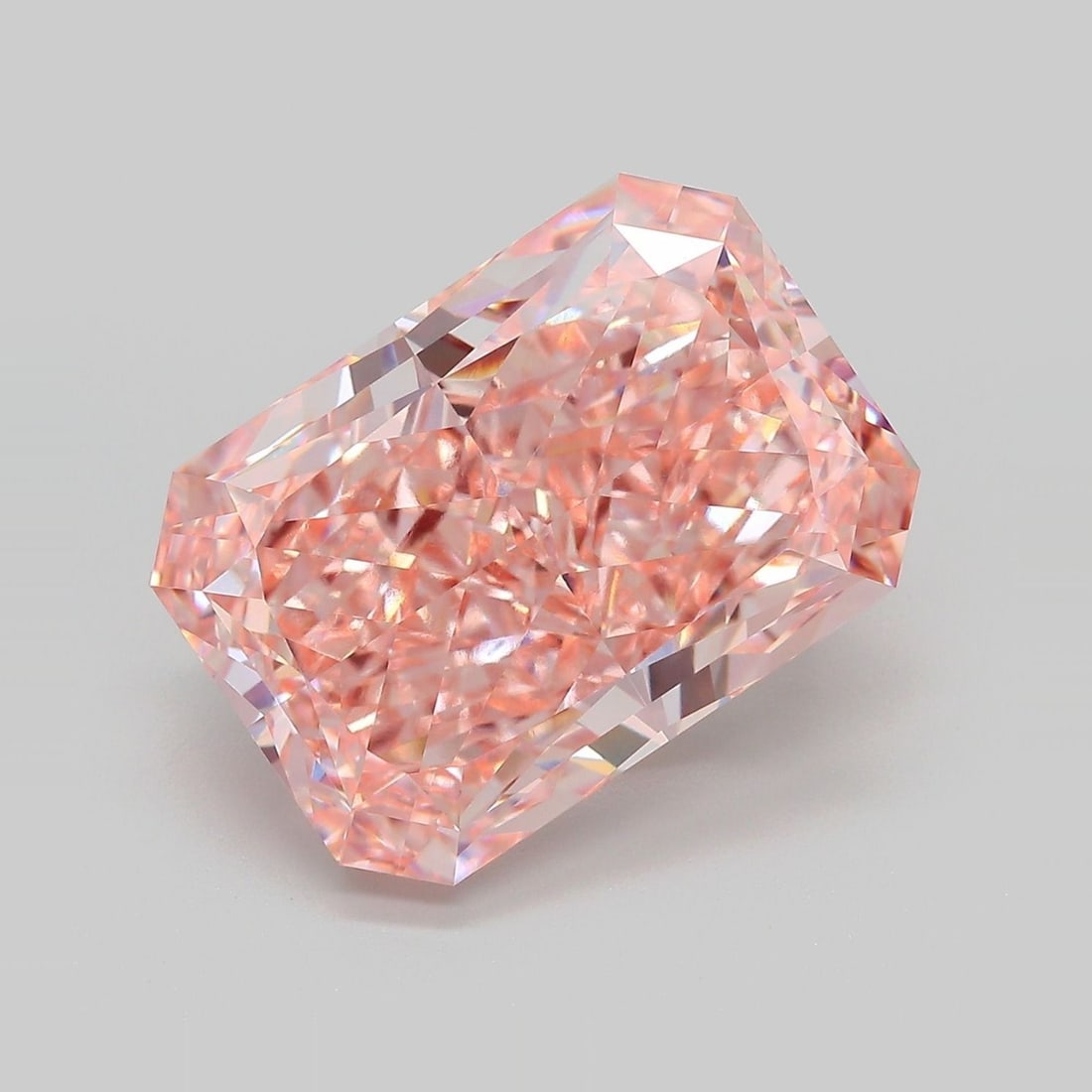 Loose Diamond - RADIANT 12.97ct Fancy Vivid Pink VS1: Loose Diamond - RADIANT 12.97ct Fancy Vivid Pink VS1 Source: This is a real non-mined Diamond that has been grown in a lab Shape: RADIANT Carats: 12.97 Color: Fancy Vivid Pink Certification: IGI Video