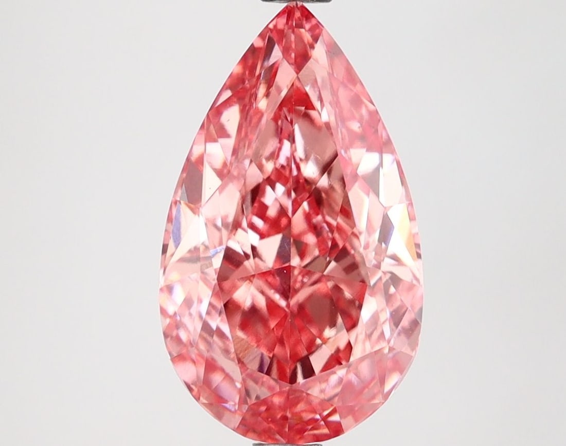 Loose Diamond - PEAR 3.51ct Fancy Vivid Pink VS1: Loose Diamond - PEAR 3.51ct Fancy Vivid Pink VS1 Source: This is a real non-mined Diamond that has been grown in a lab Shape: PEAR Carats: 3.51 Color: Fancy Vivid Pink Certification: IGI Video: