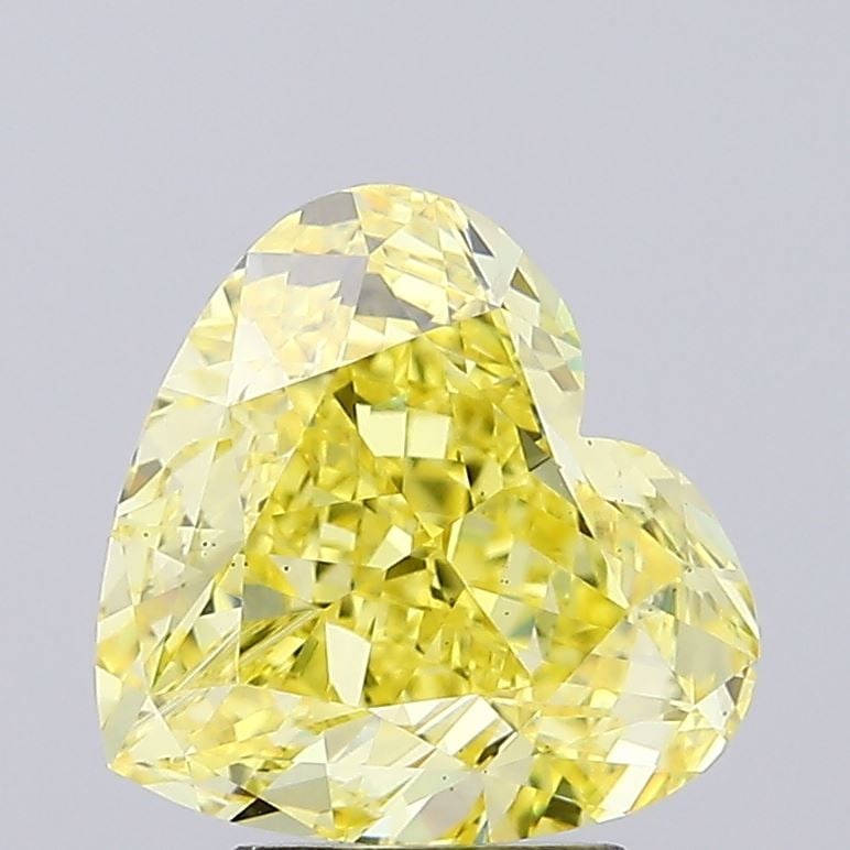 Loose Diamond - HEART 4.31ct Fancy Vivid Yellow VS2: Loose Diamond - HEART 4.31ct Fancy Vivid Yellow VS2 Source: This is a real non-mined Diamond that has been grown in a lab Shape: HEART Carats: 4.31 Color: Fancy Vivid Yellow Certification: IGI Video: