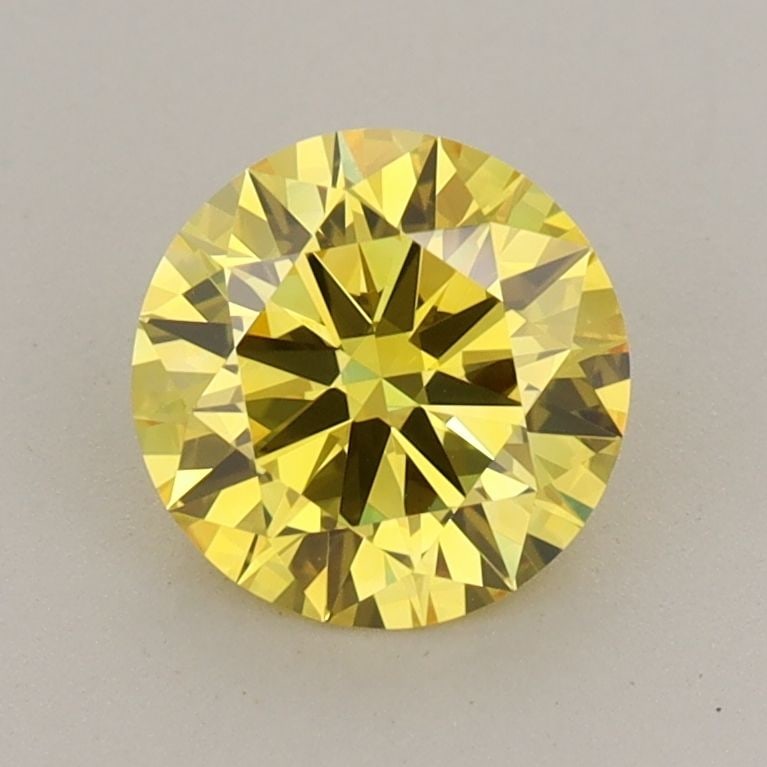 Loose Diamond - ROUND 1.12ct Fancy Vivid Yellow VVS1: Loose Diamond - ROUND 1.12ct Fancy Vivid Yellow VVS1 Source: This is a real non-mined Diamond that has been grown in a lab Shape: ROUND Carats: 1.12 Color: Fancy Vivid Yellow Certification: IGI Video: