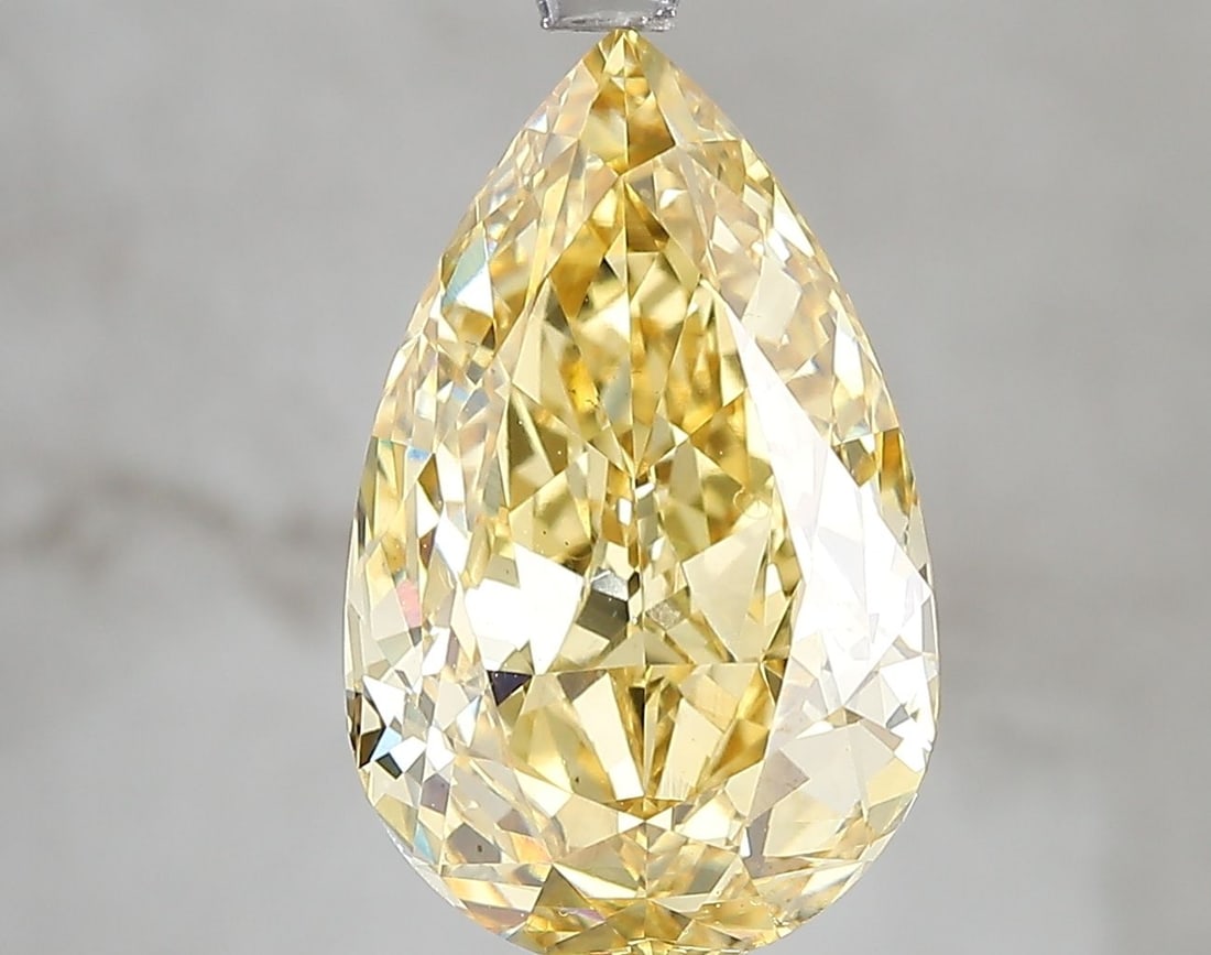 Loose Diamond - PEAR 5.01ct Fancy Vivid Yellow VS1: Loose Diamond - PEAR 5.01ct Fancy Vivid Yellow VS1 Source: This is a real non-mined Diamond that has been grown in a lab Shape: PEAR Carats: 5.01 Color: Fancy Vivid Yellow Certification: IGI Video: