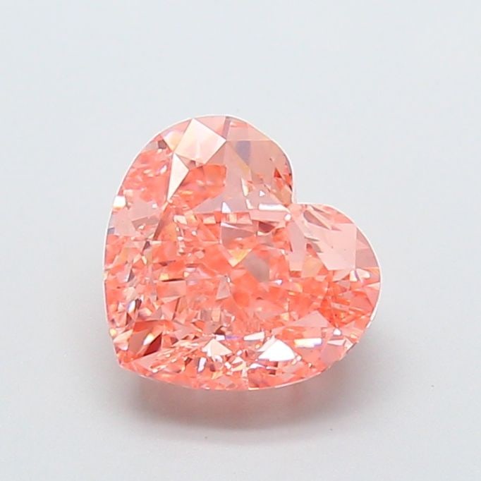 Loose Diamond - HEART 3.04ct Fancy Vivid Orange Pink VS1: Loose Diamond - HEART 3.04ct Fancy Vivid Orange Pink VS1 Source: This is a real non-mined Diamond that has been grown in a lab Shape: HEART Carats: 3.04 Color: Fancy Vivid Orange Pink Certification: I