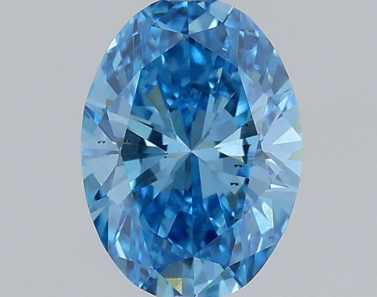 Loose Diamond - OVAL 0.41ct Fancy Vivid Blue VS2: Loose Diamond - OVAL 0.41ct Fancy Vivid Blue VS2 Source: This is a real non-mined Diamond that has been grown in a lab Shape: OVAL Carats: 0.41 Color: Fancy Vivid Blue Certification: IGI Video: