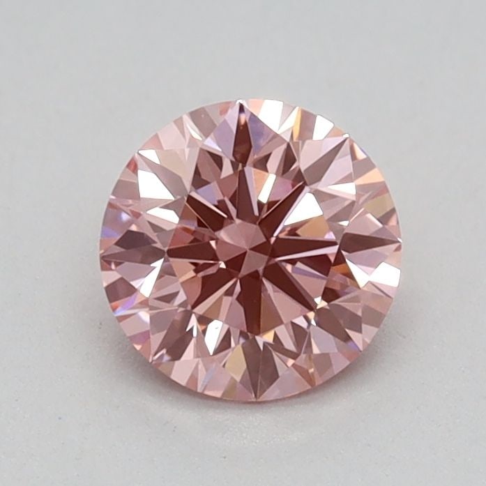 Ideal Loose Diamond - ROUND 0.51ct Fancy Vivid Pink VS1: Ideal Loose Diamond - ROUND 0.51ct Fancy Vivid Pink VS1 Source: This is a real non-mined Diamond that has been grown in a lab Shape: ROUND Carats: 0.51 Color: Fancy Vivid Pink Certification: IGI Video