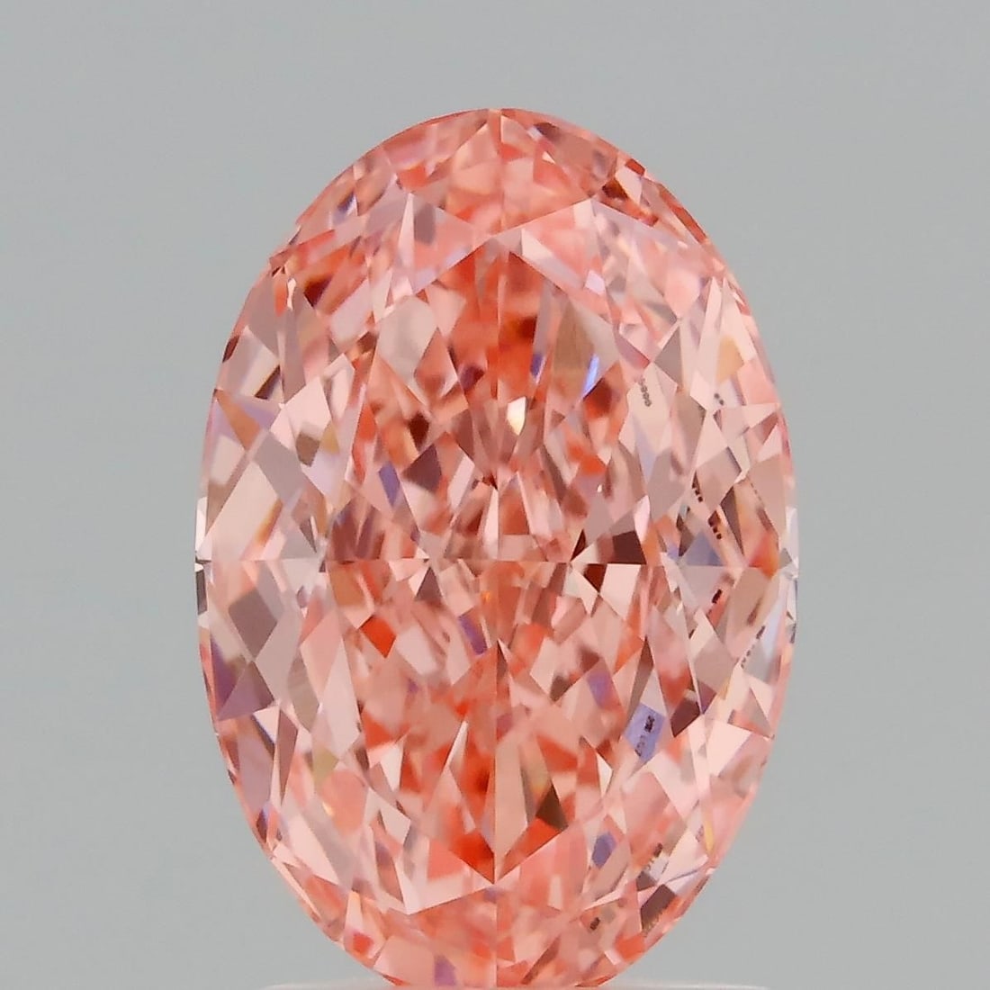Loose Diamond - OVAL 2.04ct Fancy Vivid Pink VVS2: Loose Diamond - OVAL 2.04ct Fancy Vivid Pink VVS2 Source: This is a real non-mined Diamond that has been grown in a lab Shape: OVAL Carats: 2.04 Color: Fancy Vivid Pink Certification: IGI Video: