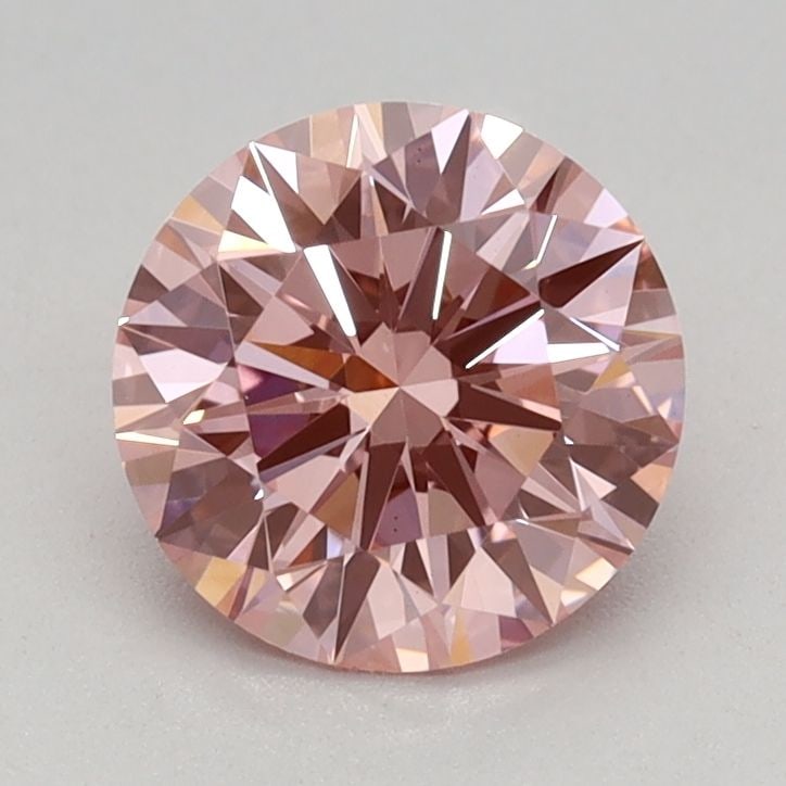 Ideal Loose Diamond - ROUND 0.9ct Fancy Vivid Pink VS1: Ideal Loose Diamond - ROUND 0.9ct Fancy Vivid Pink VS1 Source: This is a real non-mined Diamond that has been grown in a lab Shape: ROUND Carats: 0.9 Color: Fancy Vivid Pink Certification: IGI Video: