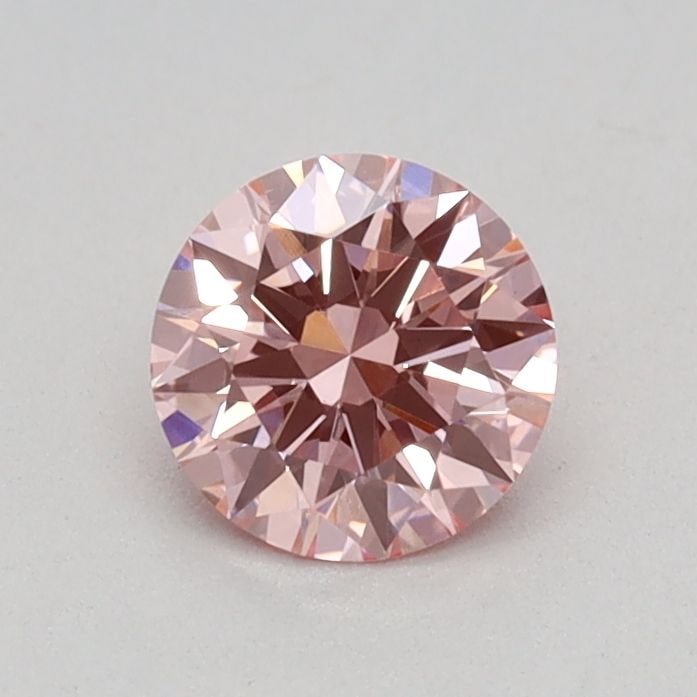 Loose Diamond - ROUND 0.4ct Fancy Vivid Pink VS1: Loose Diamond - ROUND 0.4ct Fancy Vivid Pink VS1 Source: This is a real non-mined Diamond that has been grown in a lab Shape: ROUND Carats: 0.4 Color: Fancy Vivid Pink Certification: IGI Video: