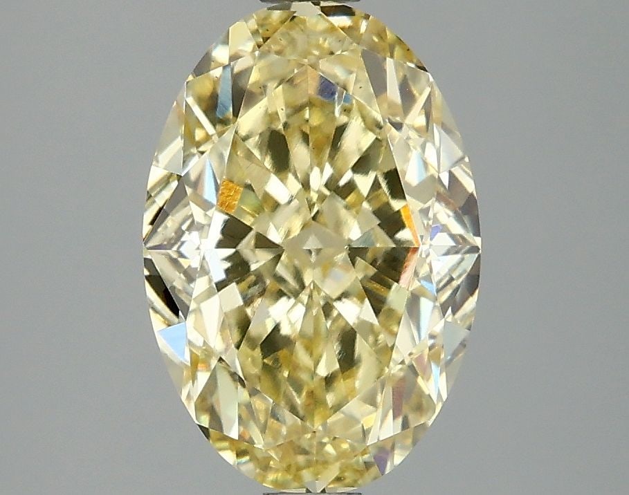 Loose Diamond - OVAL 3.09ct Fancy Intense Yellow VS1: Loose Diamond - OVAL 3.09ct Fancy Intense Yellow VS1 Source: This is a real non-mined Diamond that has been grown in a lab Shape: OVAL Carats: 3.09 Color: Fancy Intense Yellow Certification: IGI Video