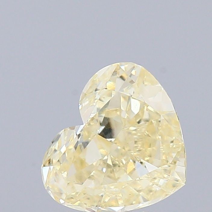 Loose Diamond - HEART 0.88ct Fancy Light Yellow VS1: Loose Diamond - HEART 0.88ct Fancy Light Yellow VS1 Source: This is a real non-mined Diamond that has been grown in a lab Shape: HEART Carats: 0.88 Color: Fancy Light Yellow Certification: IGI Video: