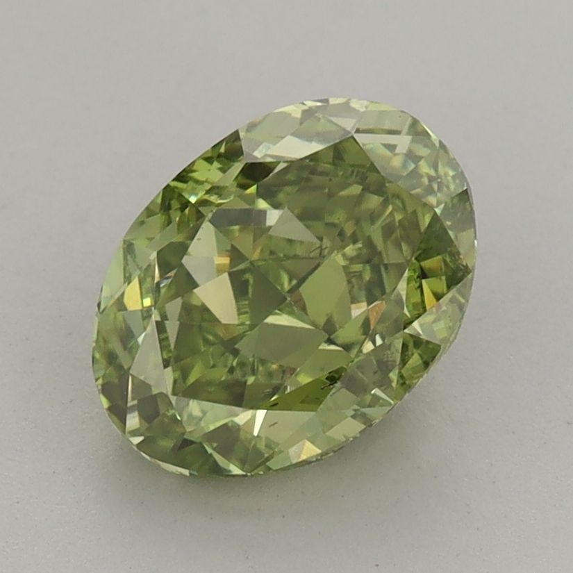 Loose Diamond - OVAL 1.99ct Fancy Vivid Green VS2: Loose Diamond - OVAL 1.99ct Fancy Vivid Green VS2 Source: This is a real non-mined Diamond that has been grown in a lab Shape: OVAL Carats: 1.99 Color: Fancy Vivid Green Certification: IGI Video: