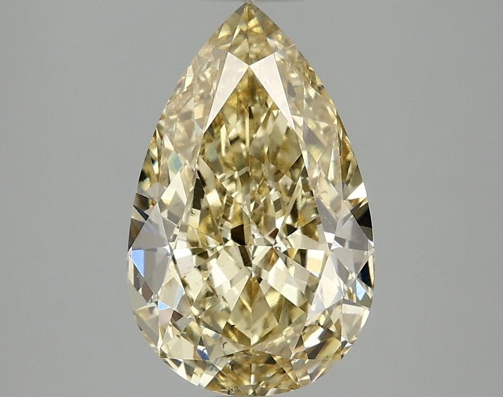 Loose Diamond - PEAR 3.1ct Fancy Vivid Yellow VS2: Loose Diamond - PEAR 3.1ct Fancy Vivid Yellow VS2 Source: This is a real non-mined Diamond that has been grown in a lab Shape: PEAR Carats: 3.1 Color: Fancy Vivid Yellow Certification: IGI Video: