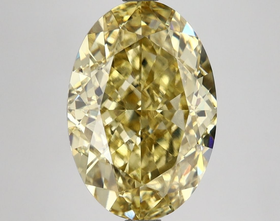 Loose Diamond - OVAL 5.23ct Fancy Vivid Yellow VVS2: Loose Diamond - OVAL 5.23ct Fancy Vivid Yellow VVS2 Source: This is a real non-mined Diamond that has been grown in a lab Shape: OVAL Carats: 5.23 Color: Fancy Vivid Yellow Certification: IGI Video: