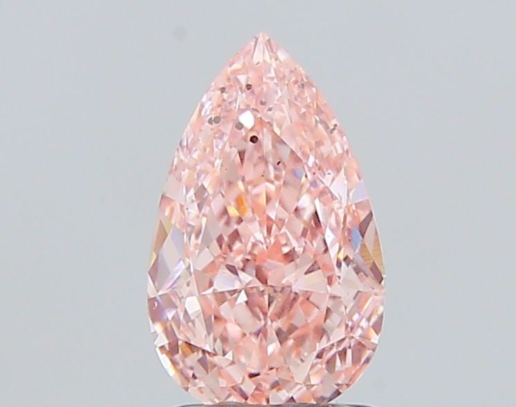 Loose Diamond - PEAR 1.5ct Fancy Vivid Pink SI2: Loose Diamond - PEAR 1.5ct Fancy Vivid Pink SI2 Source: This is a real non-mined Diamond that has been grown in a lab Shape: PEAR Carats: 1.5 Color: Fancy Vivid Pink Certification: IGI Video: