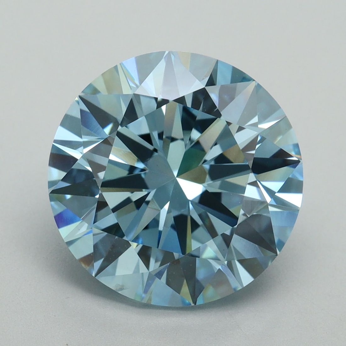 Loose Diamond - ROUND 7.01ct Fancy Vivid Blue VS2: Loose Diamond - ROUND 7.01ct Fancy Vivid Blue VS2 Source: This is a real non-mined Diamond that has been grown in a lab Shape: ROUND Carats: 7.01 Color: Fancy Vivid Blue Certification: IGI Video: