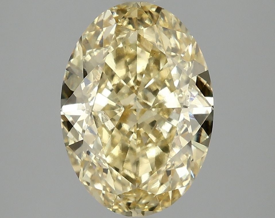 Loose Diamond - OVAL 3.08ct Fancy Vivid Yellow VS1: Loose Diamond - OVAL 3.08ct Fancy Vivid Yellow VS1 Source: This is a real non-mined Diamond that has been grown in a lab Shape: OVAL Carats: 3.08 Color: Fancy Vivid Yellow Certification: IGI Video: