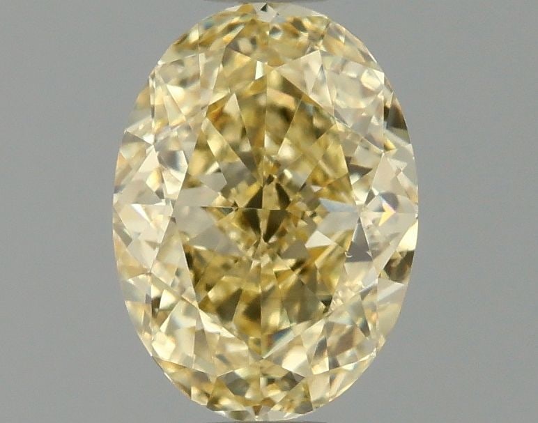 Loose Diamond - OVAL 1.03ct Fancy Intense Yellow VS1: Loose Diamond - OVAL 1.03ct Fancy Intense Yellow VS1 Source: This is a real non-mined Diamond that has been grown in a lab Shape: OVAL Carats: 1.03 Color: Fancy Intense Yellow Certification: IGI Video