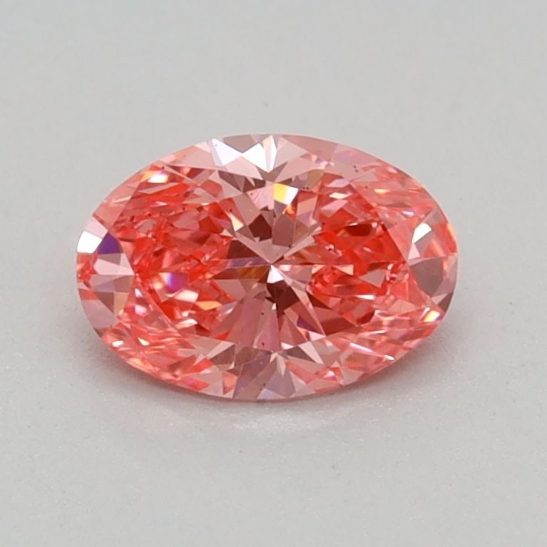 Loose Diamond - OVAL 0.36ct Fancy Vivid Pink VS2: Loose Diamond - OVAL 0.36ct Fancy Vivid Pink VS2 Source: This is a real non-mined Diamond that has been grown in a lab Shape: OVAL Carats: 0.36 Color: Fancy Vivid Pink Certification: IGI Video: