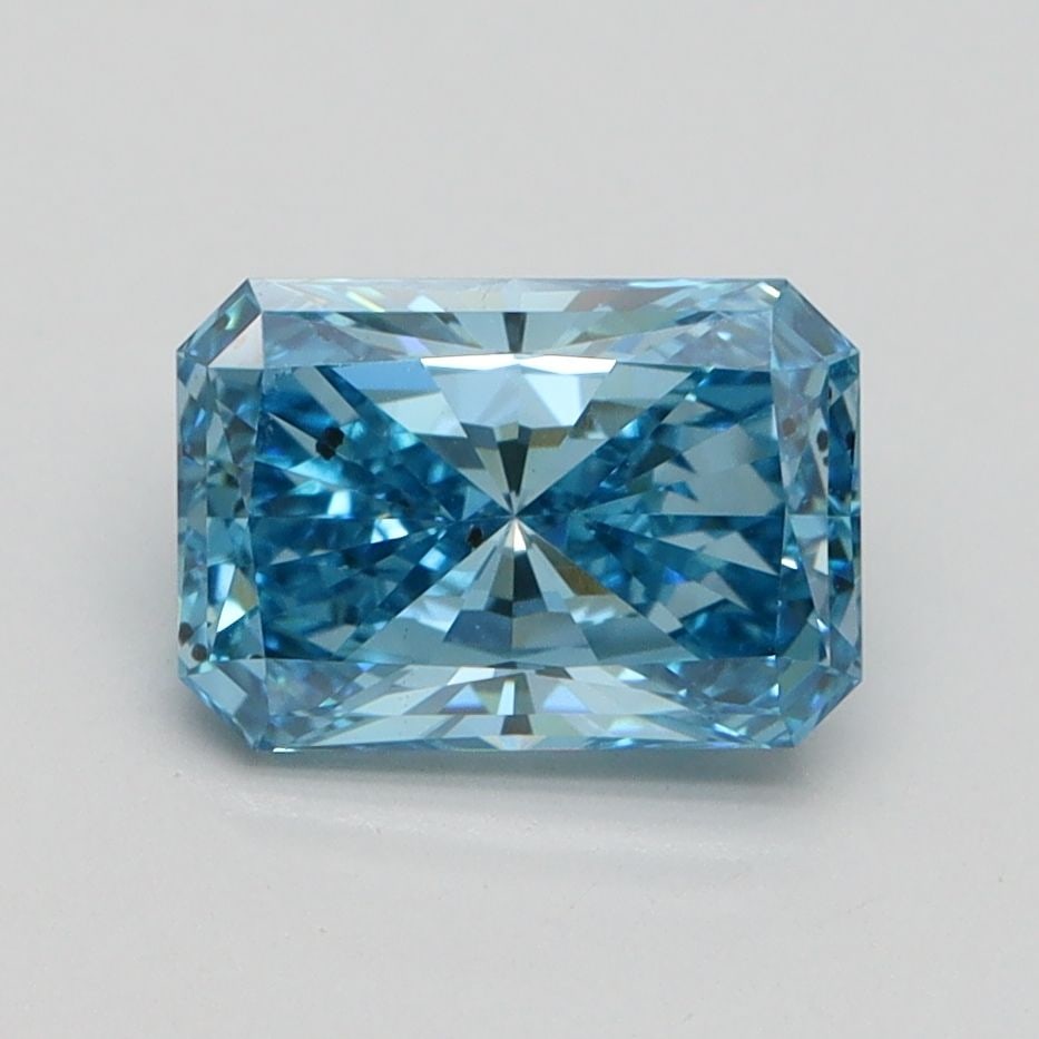 Loose Diamond - RADIANT 1.55ct Fancy Vivid Blue SI1: Loose Diamond - RADIANT 1.55ct Fancy Vivid Blue SI1 Source: This is a real non-mined Diamond that has been grown in a lab Shape: RADIANT Carats: 1.55 Color: Fancy Vivid Blue Certification: IGI Video: