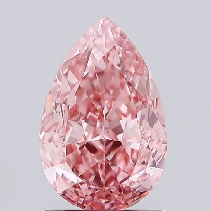 Loose Diamond - PEAR 1.53ct Fancy Vivid Pink VS2: Loose Diamond - PEAR 1.53ct Fancy Vivid Pink VS2 Source: This is a real non-mined Diamond that has been grown in a lab Shape: PEAR Carats: 1.53 Color: Fancy Vivid Pink Certification: IGI Video: