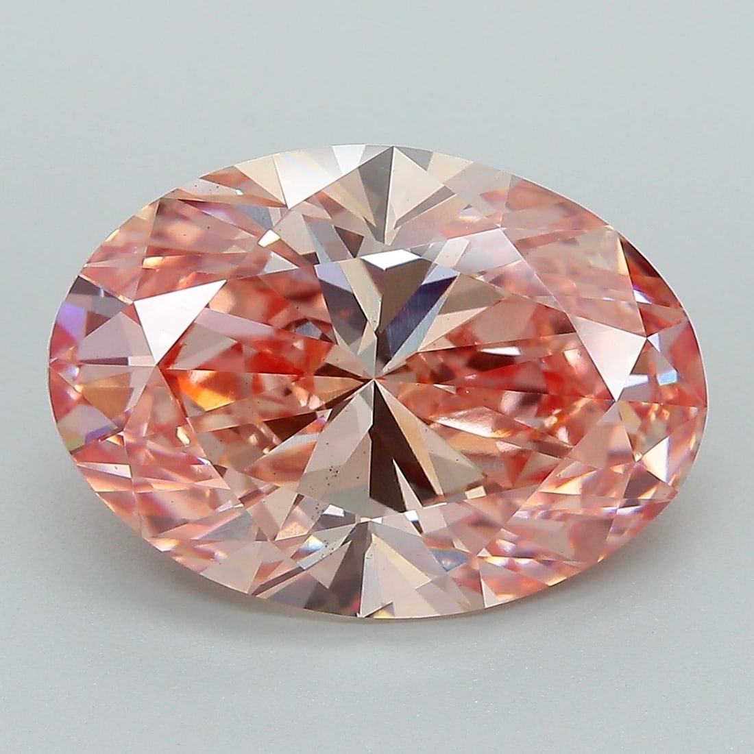 Loose Diamond - OVAL 7.01ct Fancy Vivid Pink VS2: Loose Diamond - OVAL 7.01ct Fancy Vivid Pink VS2 Source: This is a real non-mined Diamond that has been grown in a lab Shape: OVAL Carats: 7.01 Color: Fancy Vivid Pink Certification: IGI Video: