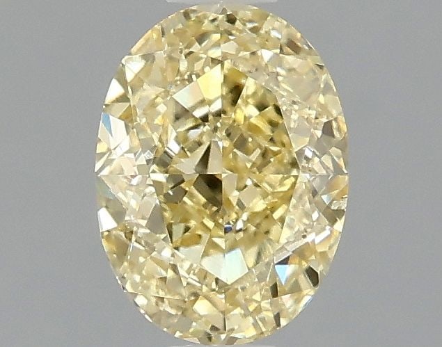 Loose Diamond - OVAL 1.03ct Fancy Intense Yellow VS2: Loose Diamond - OVAL 1.03ct Fancy Intense Yellow VS2 Source: This is a real non-mined Diamond that has been grown in a lab Shape: OVAL Carats: 1.03 Color: Fancy Intense Yellow Certification: IGI Video
