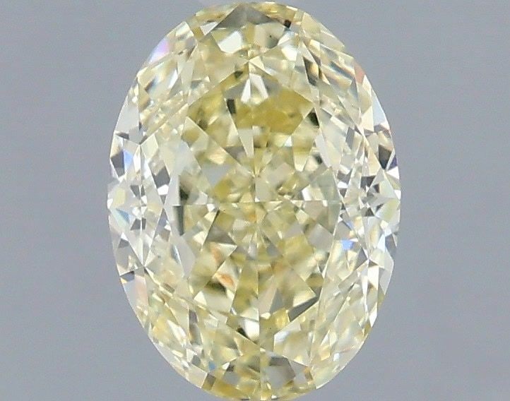 Loose Diamond - OVAL 1.1ct Fancy Light Yellow VVS2: Loose Diamond - OVAL 1.1ct Fancy Light Yellow VVS2 Source: This is a real non-mined Diamond that has been grown in a lab Shape: OVAL Carats: 1.1 Color: Fancy Light Yellow Certification: IGI Video: