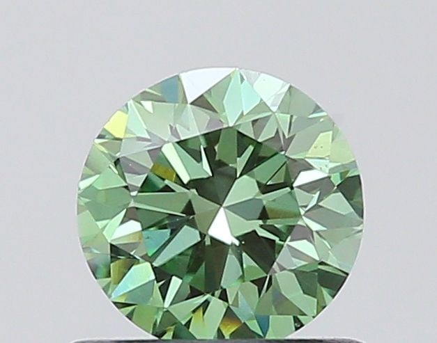 Loose Diamond - ROUND 0.64ct Fancy Vivid Green VVS2: Loose Diamond - ROUND 0.64ct Fancy Vivid Green VVS2 Source: This is a real non-mined Diamond that has been grown in a lab Shape: ROUND Carats: 0.64 Color: Fancy Vivid Green Certification: IGI Video: