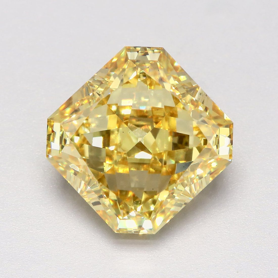 Loose Diamond - SQUARE RADIANT 8.03ct Fancy Vivid Yellow VS2: Loose Diamond - SQUARE RADIANT 8.03ct Fancy Vivid Yellow VS2 Source: This is a real non-mined Diamond that has been grown in a lab Shape: SQUARE RADIANT Carats: 8.03 Color: Fancy Vivid Yellow Certific