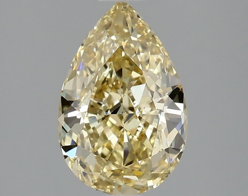 Loose Diamond - PEAR 2.01ct Fancy Intense Yellow VVS2: Loose Diamond - PEAR 2.01ct Fancy Intense Yellow VVS2 Source: This is a real non-mined Diamond that has been grown in a lab Shape: PEAR Carats: 2.01 Color: Fancy Intense Yellow Certification: IGI Vide