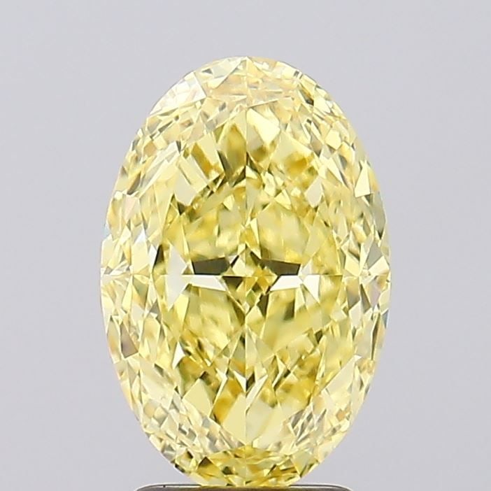 Loose Diamond - OVAL 3.27ct Fancy Vivid Yellow VVS2: Loose Diamond - OVAL 3.27ct Fancy Vivid Yellow VVS2 Source: This is a real non-mined Diamond that has been grown in a lab Shape: OVAL Carats: 3.27 Color: Fancy Vivid Yellow Certification: IGI Video: