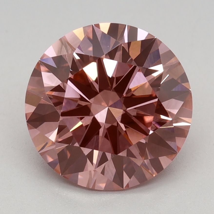 Ideal Loose Diamond - ROUND 2.02ct Fancy Vivid Pink VS2: Ideal Loose Diamond - ROUND 2.02ct Fancy Vivid Pink VS2 Source: This is a real non-mined Diamond that has been grown in a lab Shape: ROUND Carats: 2.02 Color: Fancy Vivid Pink Certification: IGI Video