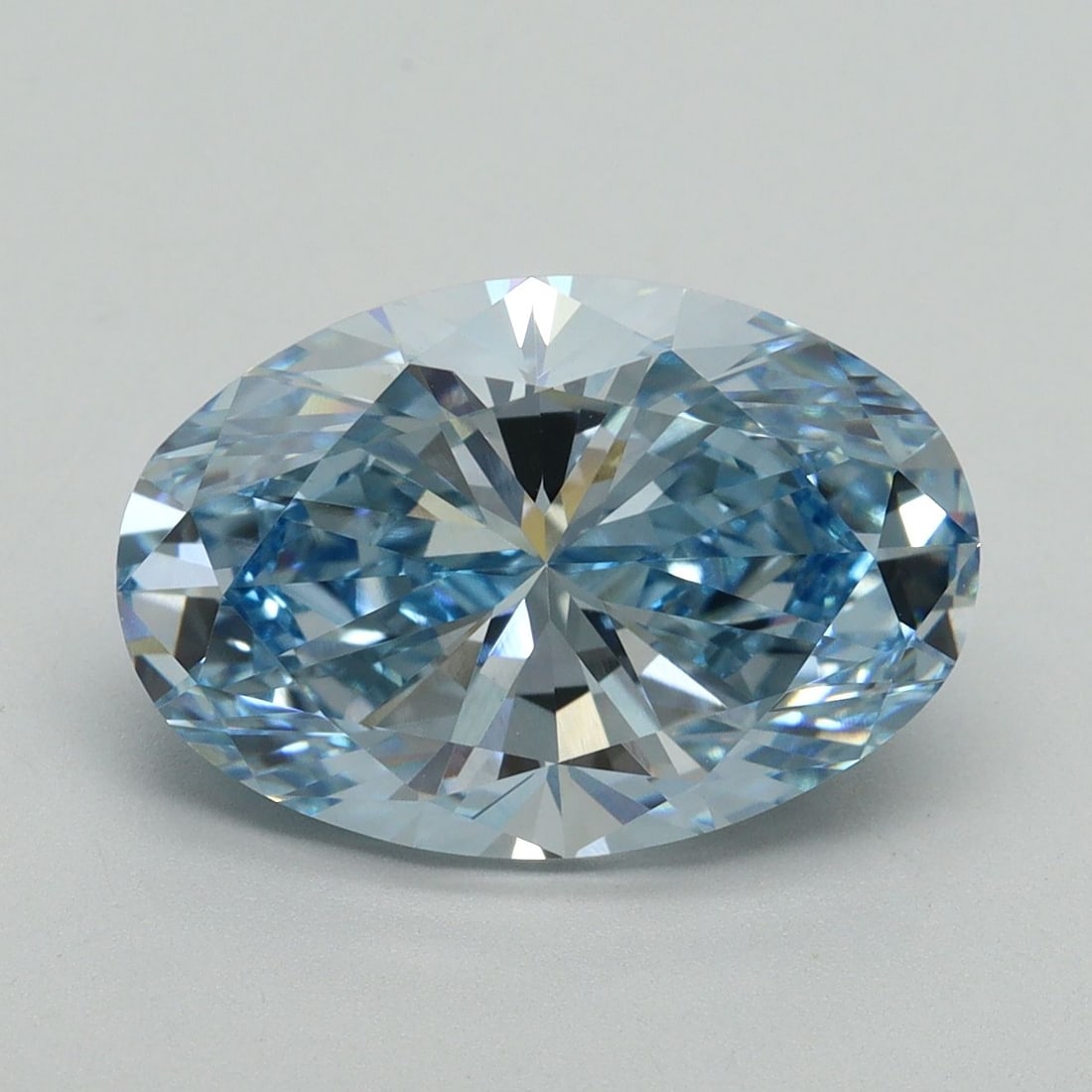 Loose Diamond - OVAL 5.2ct Fancy Vivid Blue VVS2: Loose Diamond - OVAL 5.2ct Fancy Vivid Blue VVS2 Source: This is a real non-mined Diamond that has been grown in a lab Shape: OVAL Carats: 5.2 Color: Fancy Vivid Blue Certification: IGI Video: