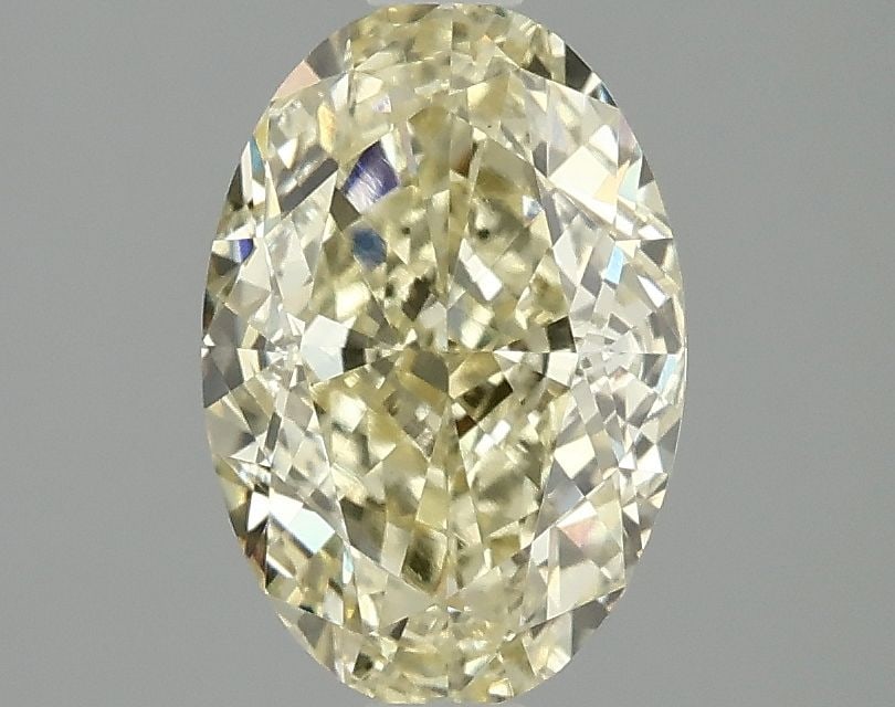 Loose Diamond - OVAL 2.1ct Fancy Intense Yellow VS1: Loose Diamond - OVAL 2.1ct Fancy Intense Yellow VS1 Source: This is a real non-mined Diamond that has been grown in a lab Shape: OVAL Carats: 2.1 Color: Fancy Intense Yellow Certification: IGI Video: