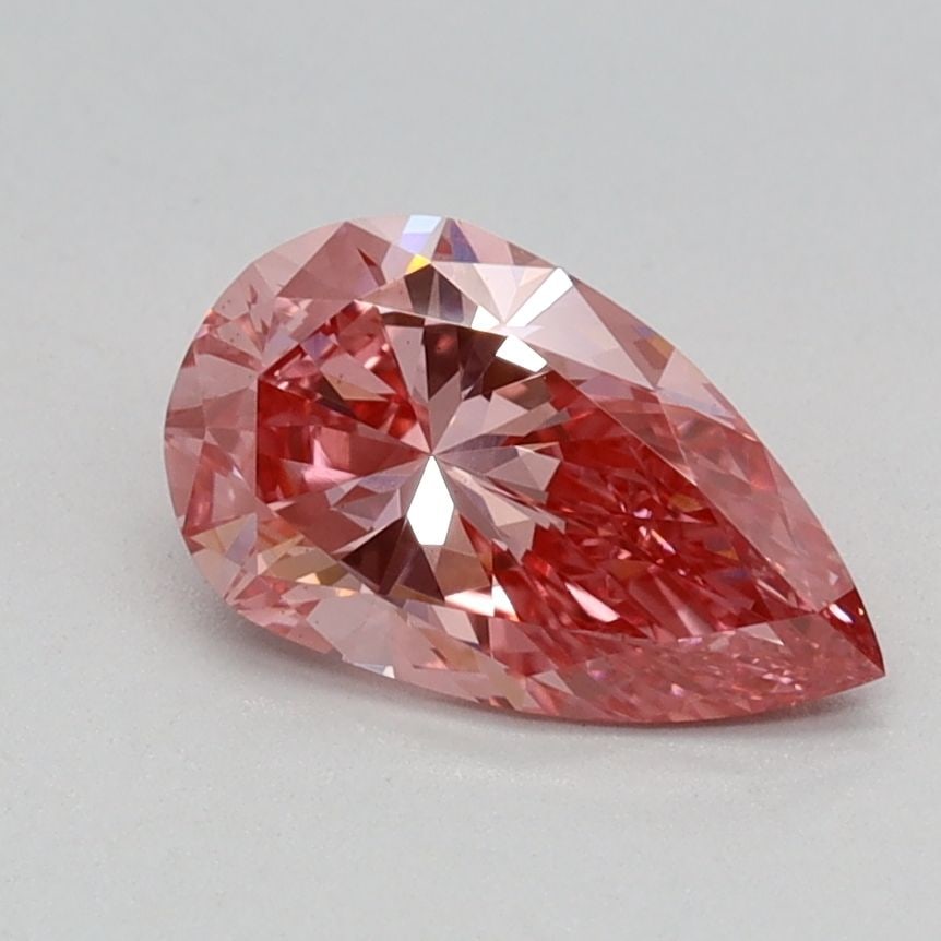 Loose Diamond - PEAR 0.75ct Fancy Vivid Pink VS1: Loose Diamond - PEAR 0.75ct Fancy Vivid Pink VS1 Source: This is a real non-mined Diamond that has been grown in a lab Shape: PEAR Carats: 0.75 Color: Fancy Vivid Pink Certification: IGI Video: