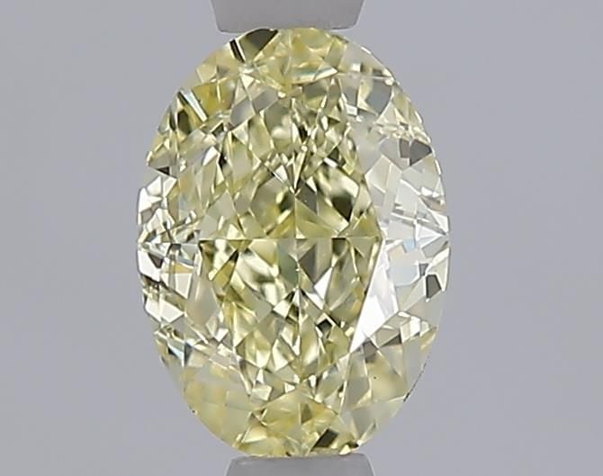 Loose Diamond - OVAL 1.0ct Fancy Yellow VS1: Loose Diamond - OVAL 1.0ct Fancy Yellow VS1 Source: This is a real non-mined Diamond that has been grown in a lab Shape: OVAL Carats: 1.0 Color: Fancy Yellow Certification: IGI Video: