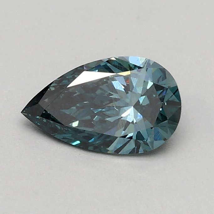 Loose Diamond - PEAR 0.31ct Fancy Vivid Green Blue VS1: Loose Diamond - PEAR 0.31ct Fancy Vivid Green Blue VS1 Source: This is a real non-mined Diamond that has been grown in a lab Shape: PEAR Carats: 0.31 Color: Fancy Vivid Green Blue Certification: IGI V