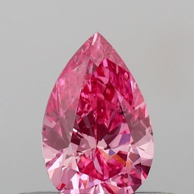 Loose Diamond - PEAR 0.42ct Fancy Vivid Pink SI2: Loose Diamond - PEAR 0.42ct Fancy Vivid Pink SI2 Source: This is a real non-mined Diamond that has been grown in a lab Shape: PEAR Carats: 0.42 Color: Fancy Vivid Pink Certification: IGI Video:
