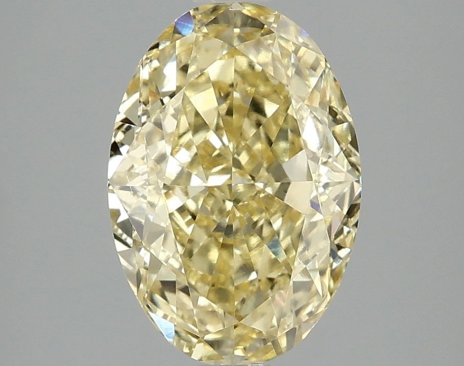 Loose Diamond - OVAL 3.07ct Fancy Vivid Yellow VS2: Loose Diamond - OVAL 3.07ct Fancy Vivid Yellow VS2 Source: This is a real non-mined Diamond that has been grown in a lab Shape: OVAL Carats: 3.07 Color: Fancy Vivid Yellow Certification: IGI Video: