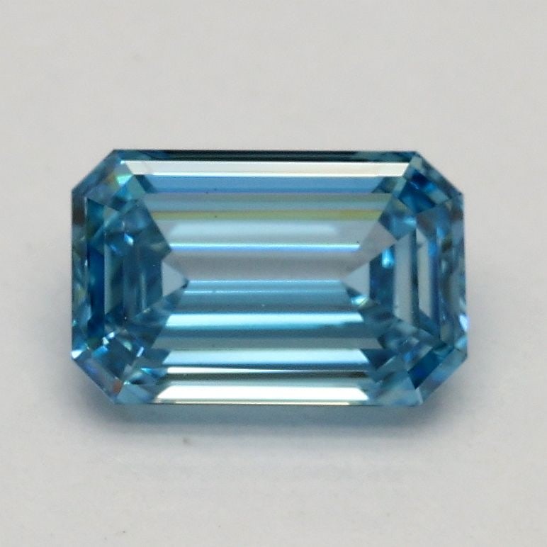 Loose Diamond - EMERALD 0.86ct Fancy Vivid Blue VS1: Loose Diamond - EMERALD 0.86ct Fancy Vivid Blue VS1 Source: This is a real non-mined Diamond that has been grown in a lab Shape: EMERALD Carats: 0.86 Color: Fancy Vivid Blue Certification: IGI Video: