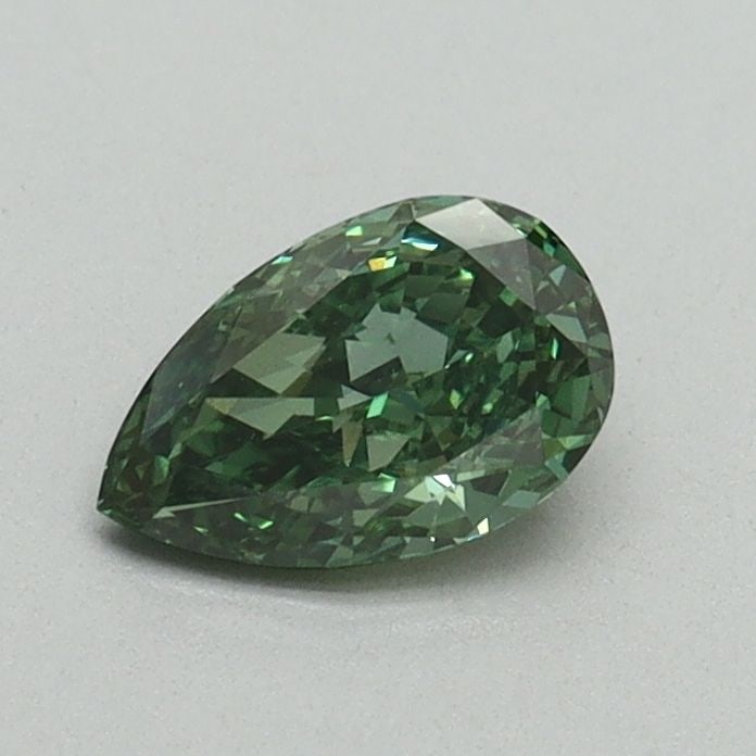 Loose Diamond - PEAR 0.52ct Fancy Vivid Green VS1: Loose Diamond - PEAR 0.52ct Fancy Vivid Green VS1 Source: This is a real non-mined Diamond that has been grown in a lab Shape: PEAR Carats: 0.52 Color: Fancy Vivid Green Certification: IGI Video: