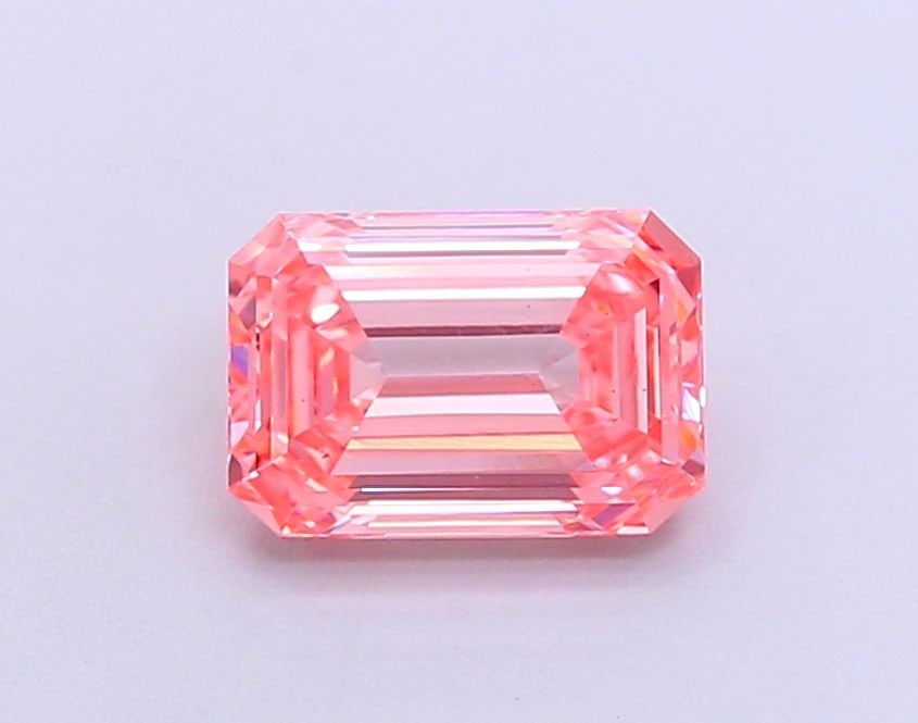 Loose Diamond - EMERALD 1.61ct Fancy Vivid Pink VS2: Loose Diamond - EMERALD 1.61ct Fancy Vivid Pink VS2 Source: This is a real non-mined Diamond that has been grown in a lab Shape: EMERALD Carats: 1.61 Color: Fancy Vivid Pink Certification: IGI Video: