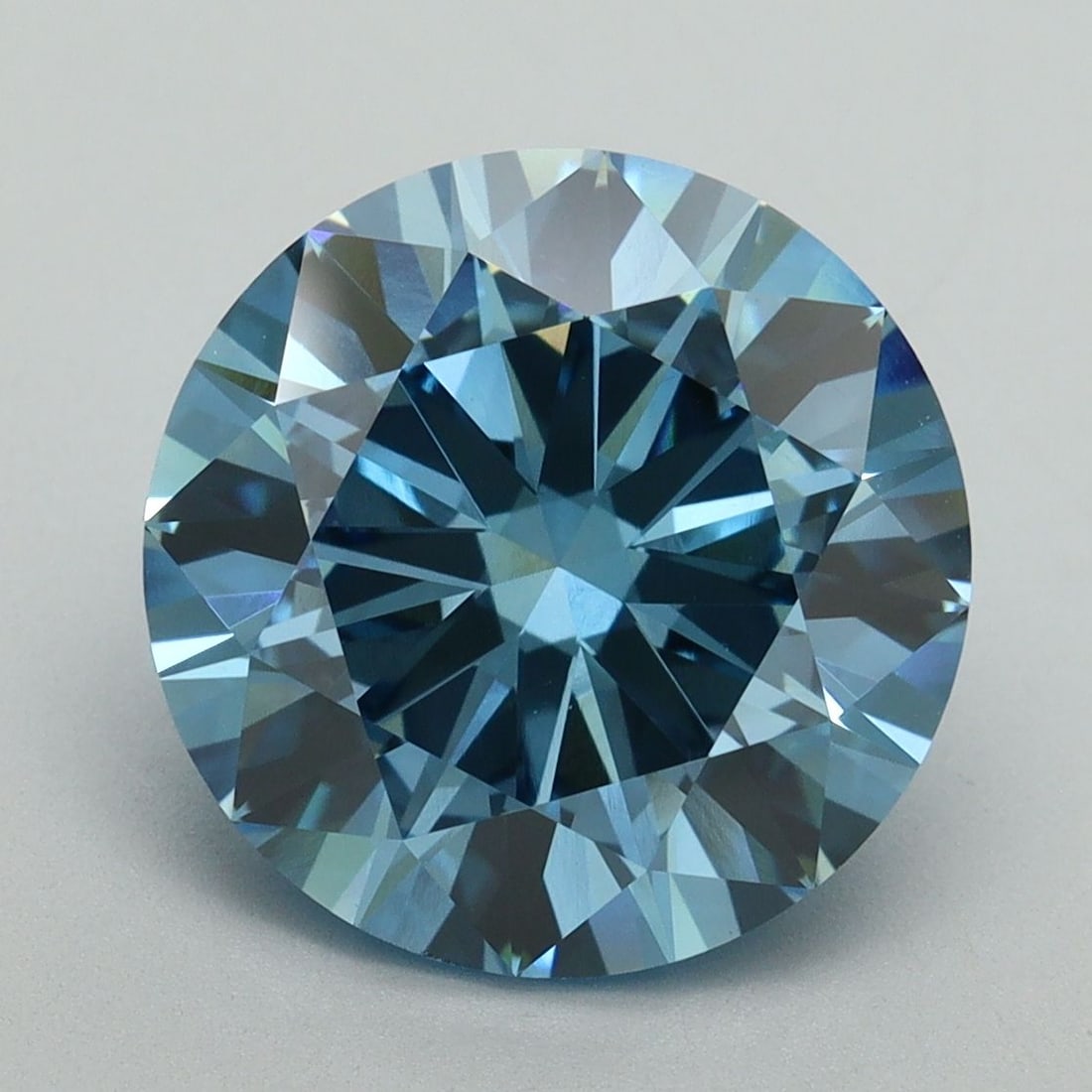 Loose Diamond - ROUND 5.04ct Fancy Vivid Blue VS1: Loose Diamond - ROUND 5.04ct Fancy Vivid Blue VS1 Source: This is a real non-mined Diamond that has been grown in a lab Shape: ROUND Carats: 5.04 Color: Fancy Vivid Blue Certification: IGI Video: