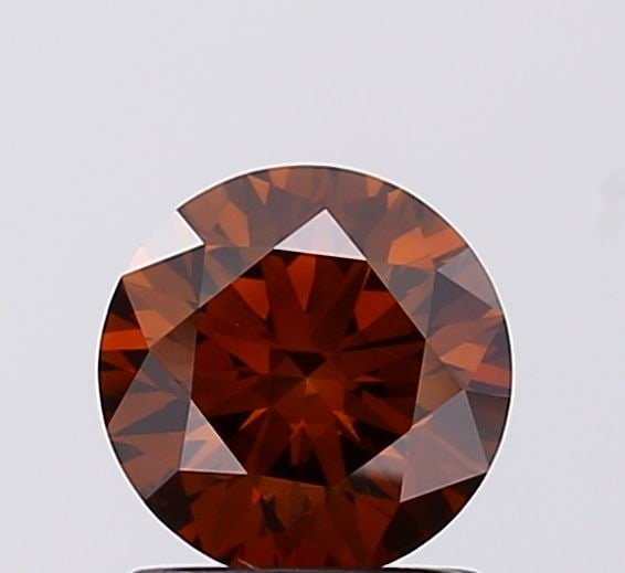 Loose Diamond - ROUND 1.04ct Fancy Deep Brown VS2: Loose Diamond - ROUND 1.04ct Fancy Deep Brown VS2 Source: This is a real non-mined Diamond that has been grown in a lab Shape: ROUND Carats: 1.04 Color: Fancy Deep Brown Certification: IGI Video: