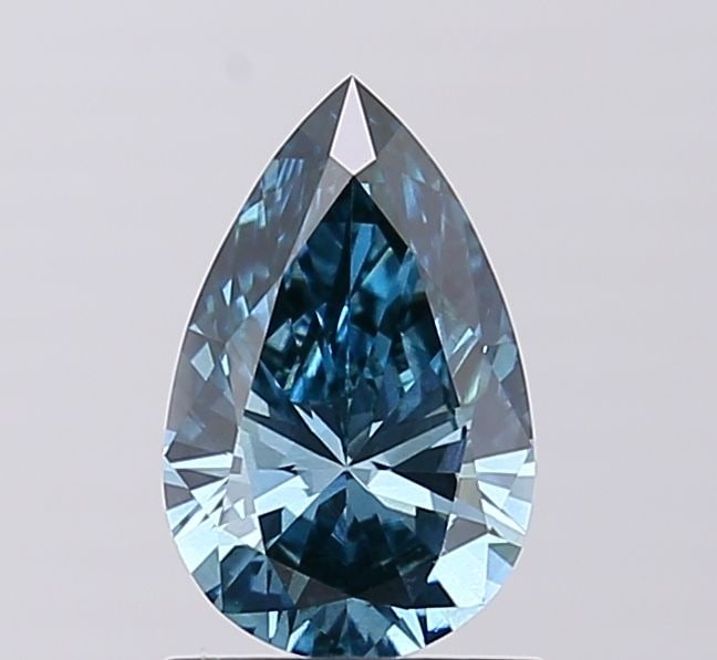 Loose Diamond - PEAR 1.03ct Fancy Vivid Blue VS2: Loose Diamond - PEAR 1.03ct Fancy Vivid Blue VS2 Source: This is a real non-mined Diamond that has been grown in a lab Shape: PEAR Carats: 1.03 Color: Fancy Vivid Blue Certification: IGI Video: