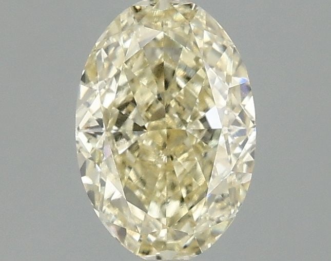 Loose Diamond - OVAL 1.1ct Fancy Yellow VS2: Loose Diamond - OVAL 1.1ct Fancy Yellow VS2 Source: This is a real non-mined Diamond that has been grown in a lab Shape: OVAL Carats: 1.1 Color: Fancy Yellow Certification: IGI Video: