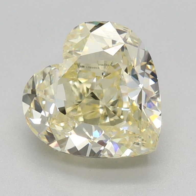 Loose Diamond - HEART 1.49ct Fancy Light Yellow VVS2: Loose Diamond - HEART 1.49ct Fancy Light Yellow VVS2 Source: This is a real non-mined Diamond that has been grown in a lab Shape: HEART Carats: 1.49 Color: Fancy Light Yellow Certification: IGI Video: