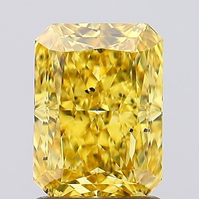 Loose Diamond - RADIANT 1.58ct Fancy Vivid Yellow SI1: Loose Diamond - RADIANT 1.58ct Fancy Vivid Yellow SI1 Source: This is a real non-mined Diamond that has been grown in a lab Shape: RADIANT Carats: 1.58 Color: Fancy Vivid Yellow Certification: IGI Vid
