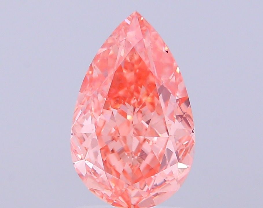 Loose Diamond - PEAR 2.55ct Fancy Vivid Pinkish Orange VVS2: Loose Diamond - PEAR 2.55ct Fancy Vivid Pinkish Orange VVS2 Source: This is a real non-mined Diamond that has been grown in a lab Shape: PEAR Carats: 2.55 Color: Fancy Vivid Pinkish Orange Certificati