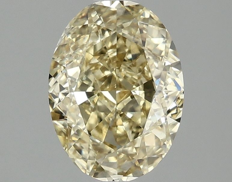 Loose Diamond - OVAL 2.06ct Fancy Vivid Yellow VS1: Loose Diamond - OVAL 2.06ct Fancy Vivid Yellow VS1 Source: This is a real non-mined Diamond that has been grown in a lab Shape: OVAL Carats: 2.06 Color: Fancy Vivid Yellow Certification: IGI Video: