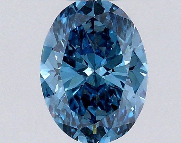 Loose Diamond - OVAL 0.53ct Fancy Vivid Blue VS1: Loose Diamond - OVAL 0.53ct Fancy Vivid Blue VS1 Source: This is a real non-mined Diamond that has been grown in a lab Shape: OVAL Carats: 0.53 Color: Fancy Vivid Blue Certification: IGI Video: